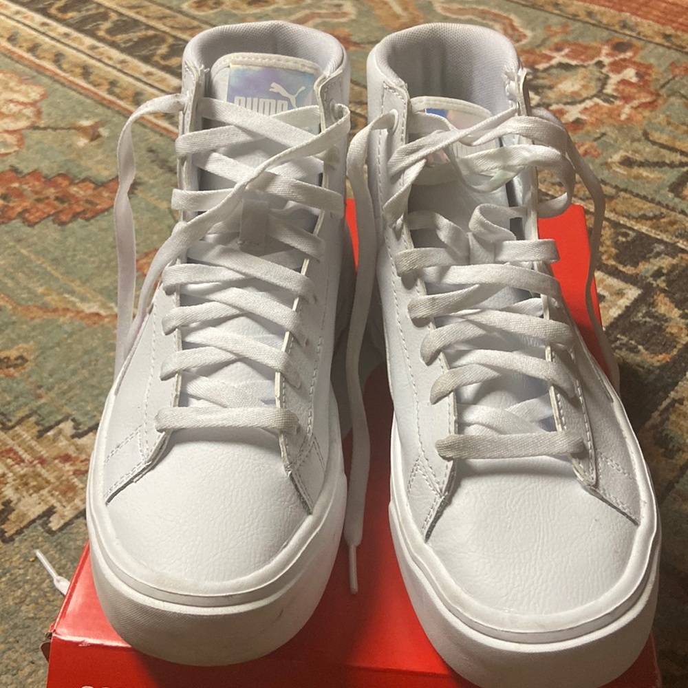 All white Girls Puma high top platform sneaker